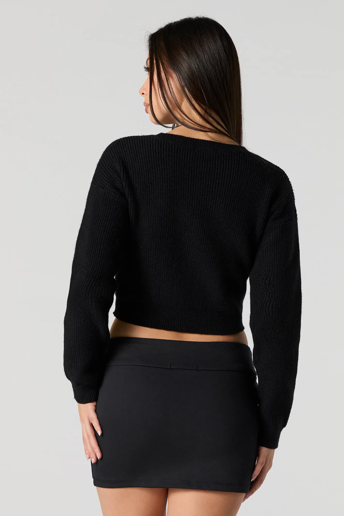Chandail court en tricot côtelé avec motif brodé