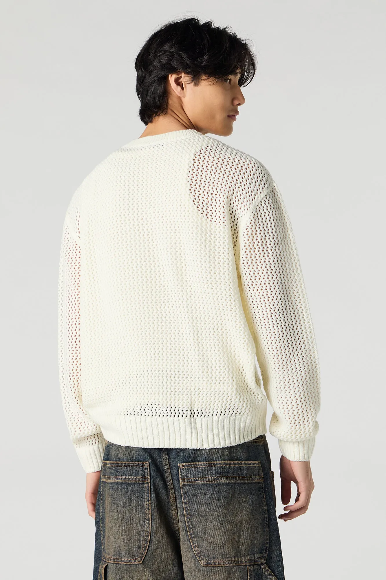 Chandail en tricot ajouré
