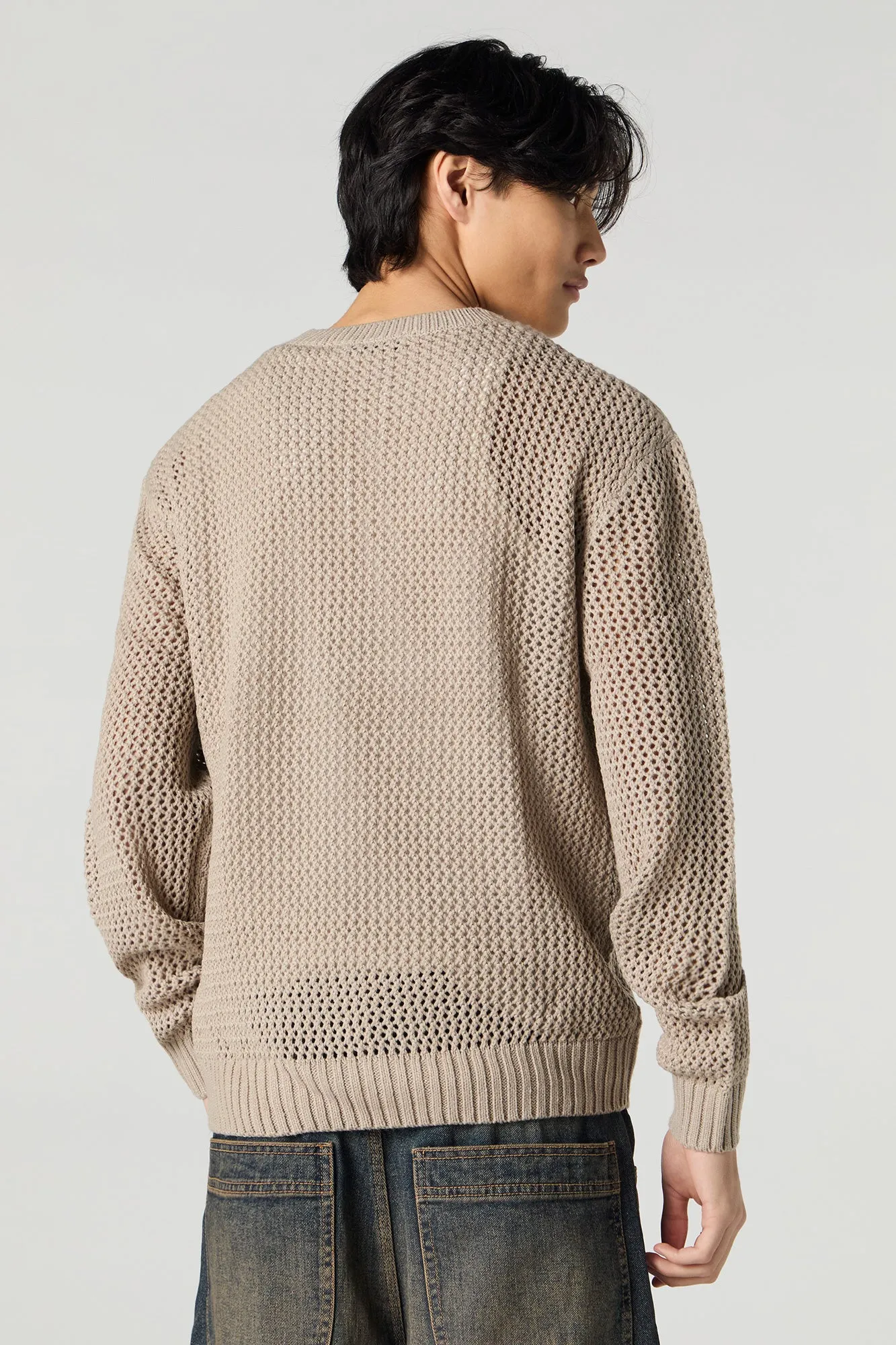 Chandail en tricot ajouré