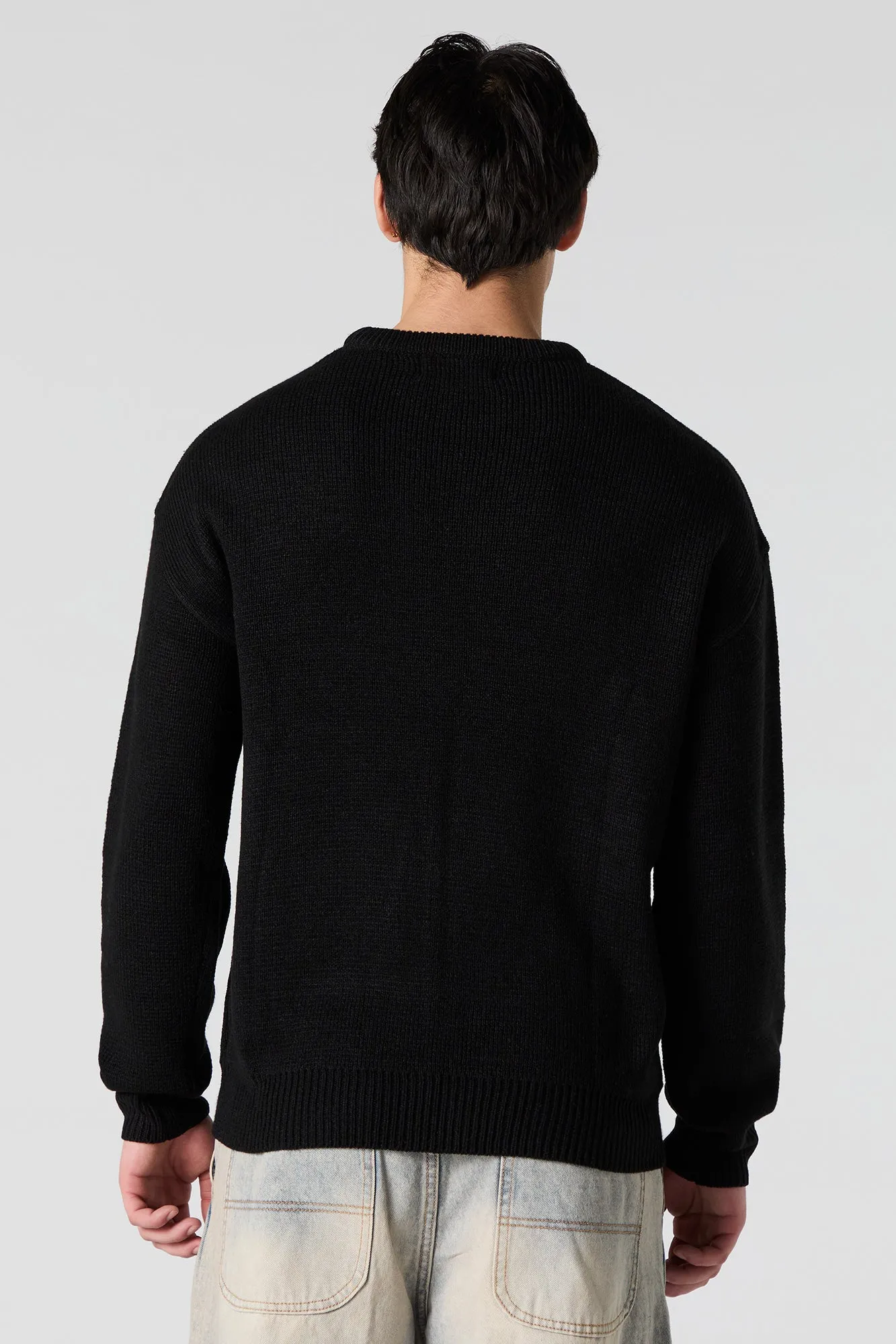 Chandail en tricot jacquard avec texte gothique
