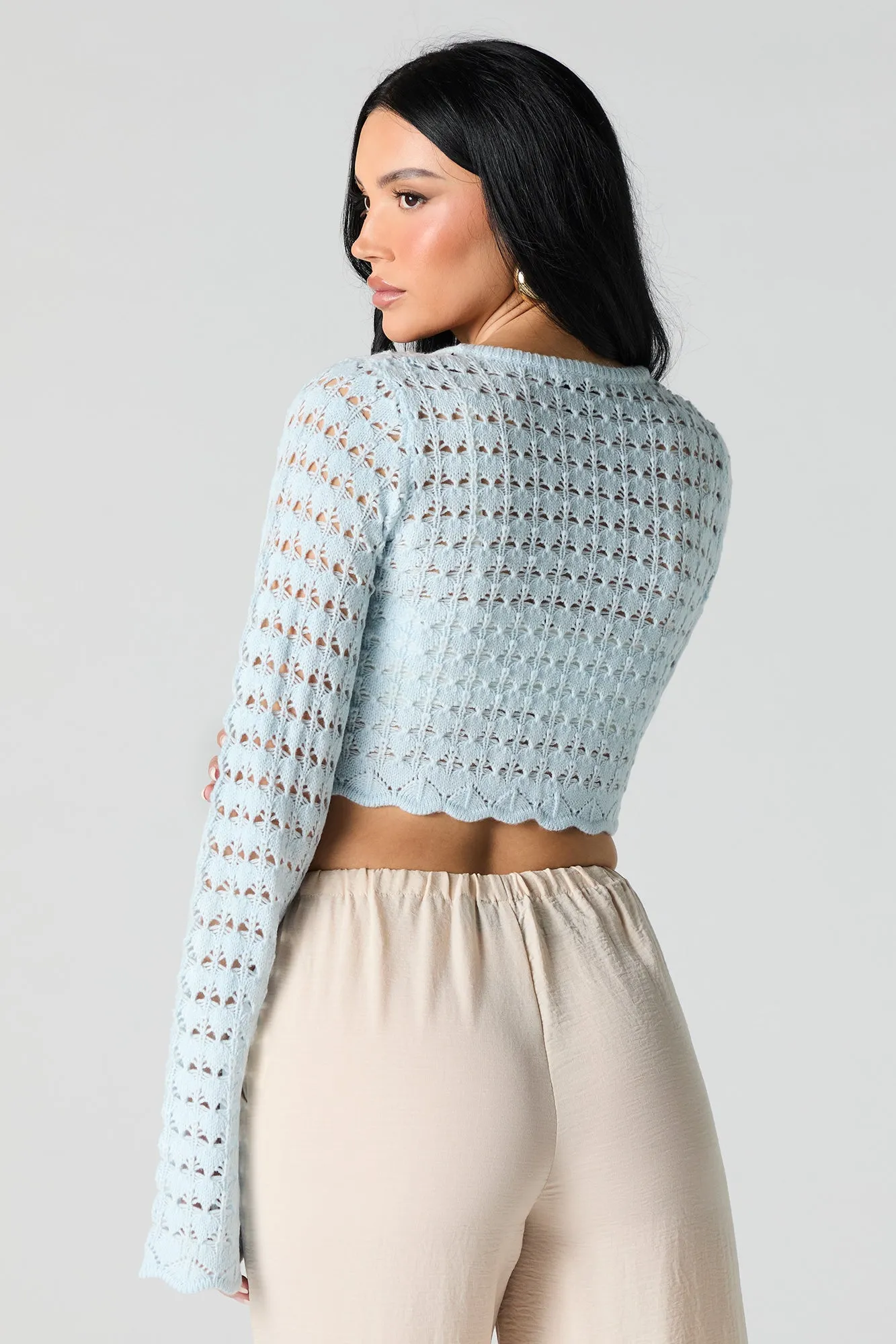 Haut crocheté court à manches longues avec taille coulissante