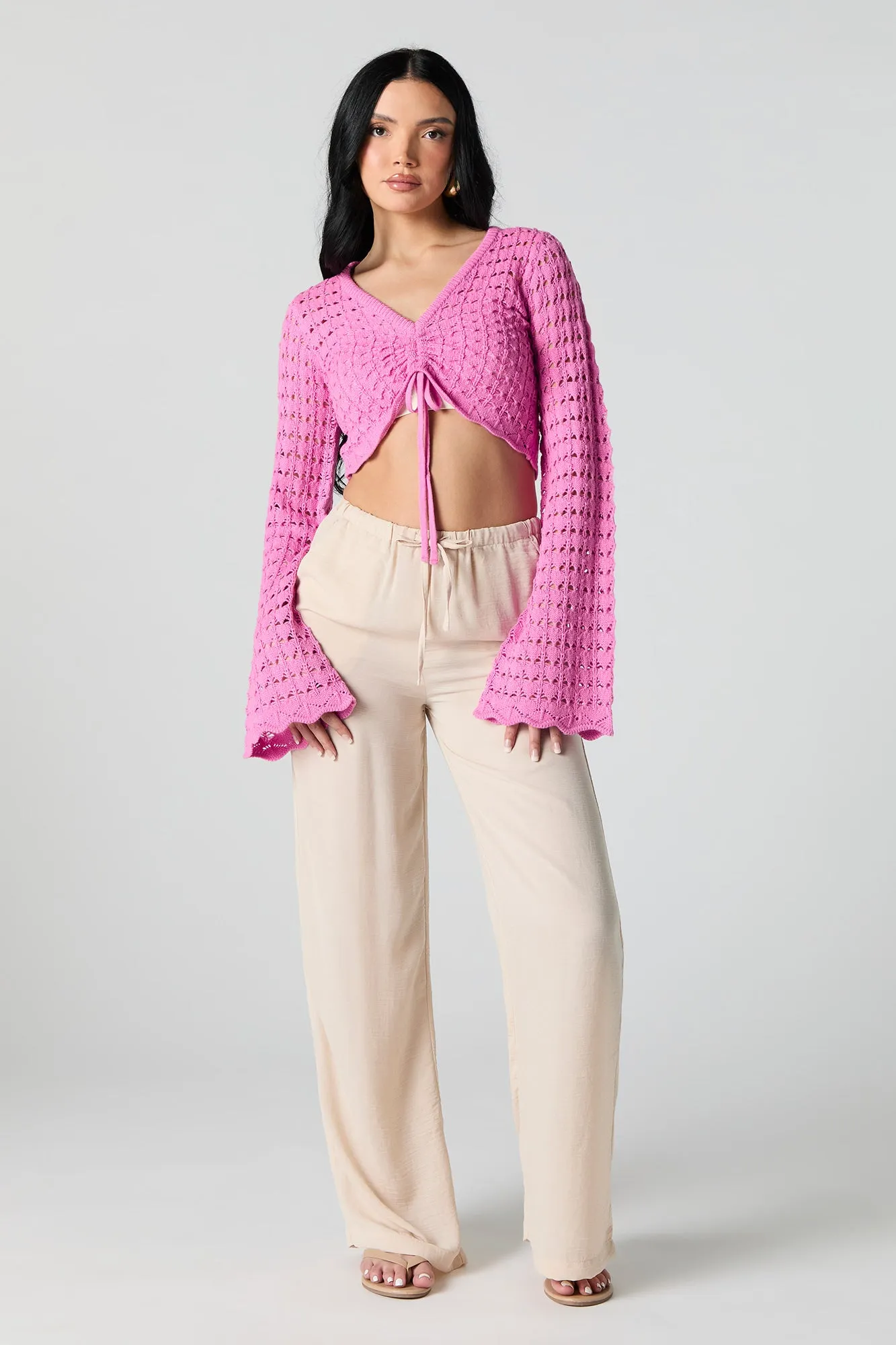 Haut crocheté court à manches longues avec taille coulissante