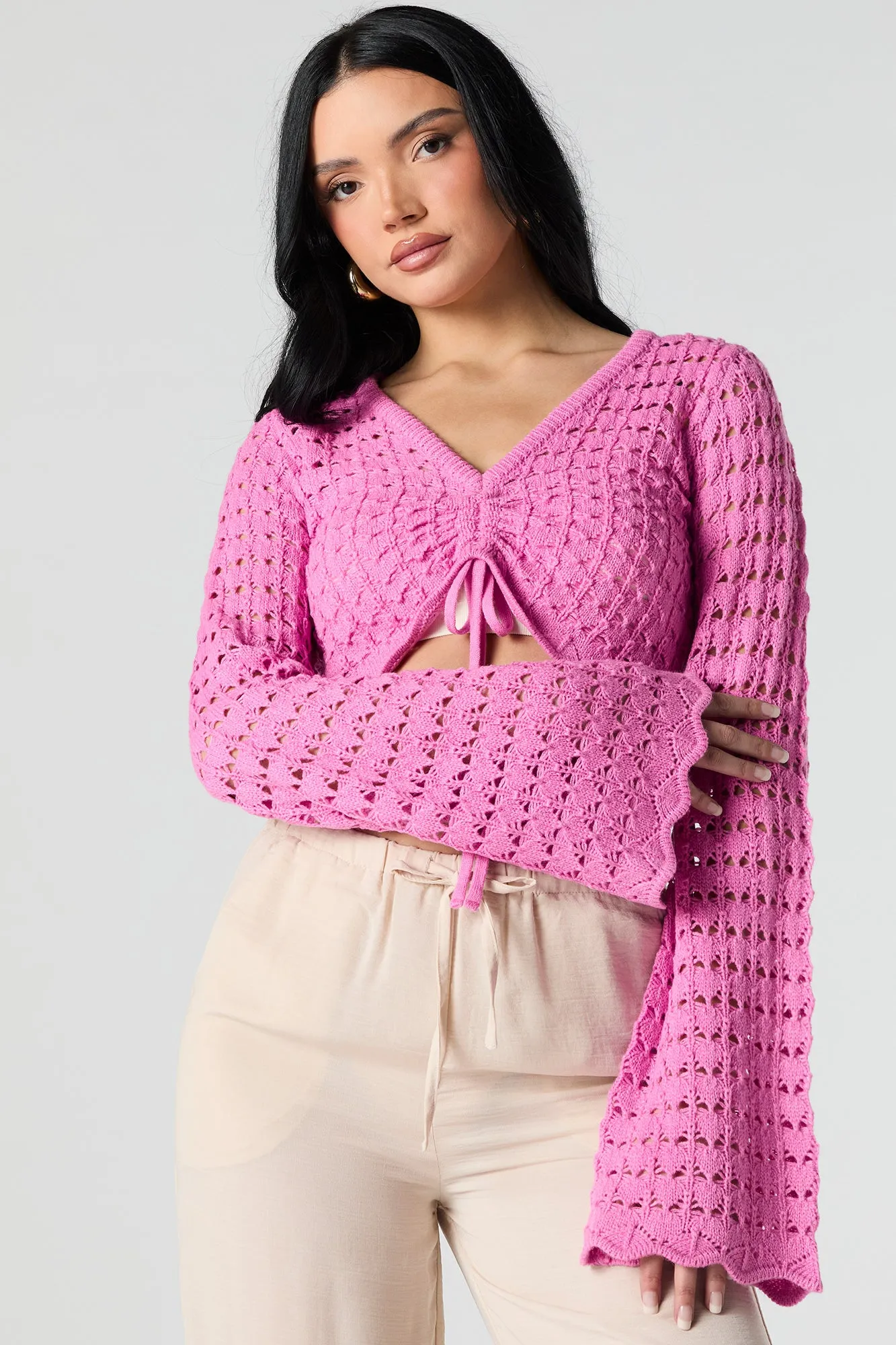 Haut crocheté court à manches longues avec taille coulissante