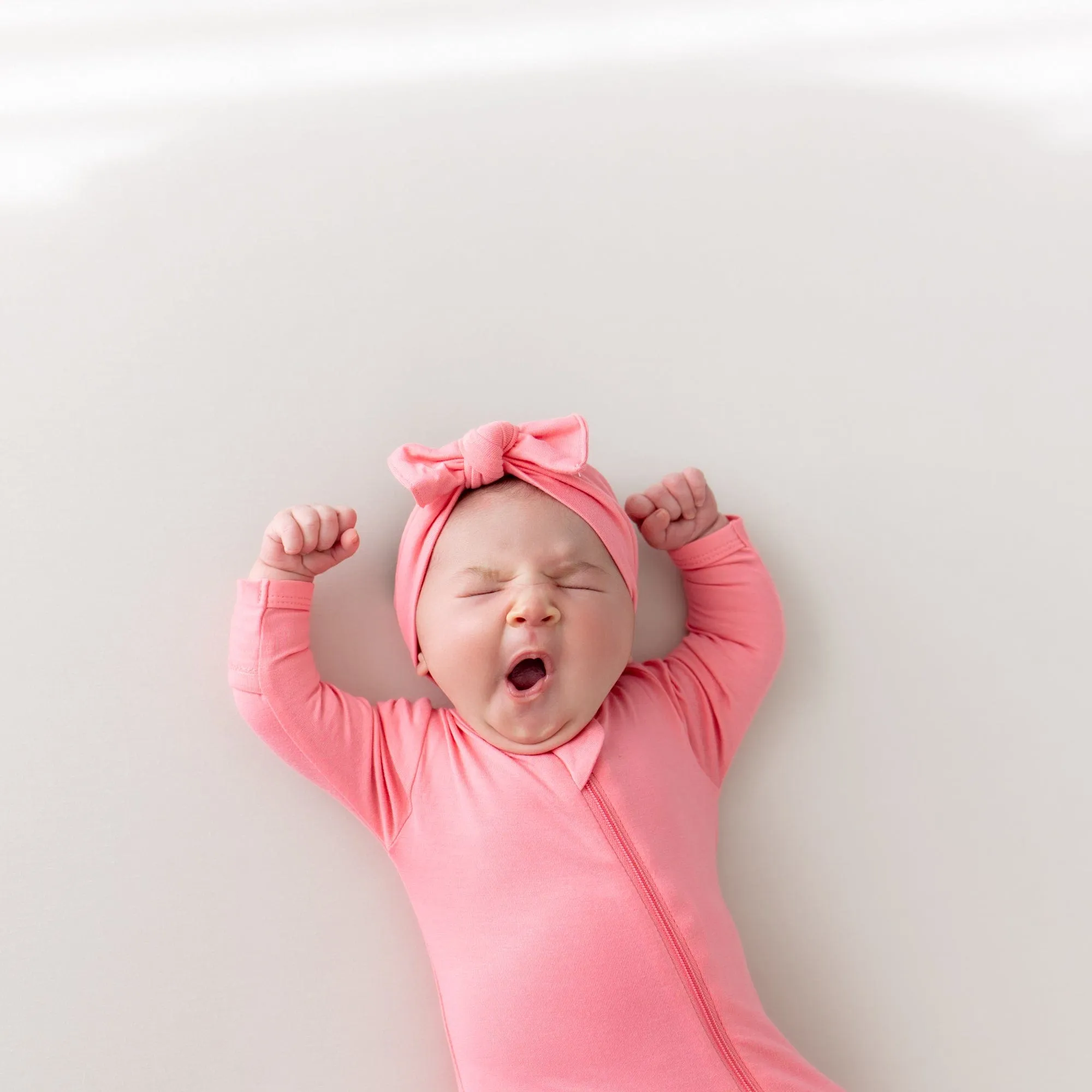 Knotted Bow Headband in Guava